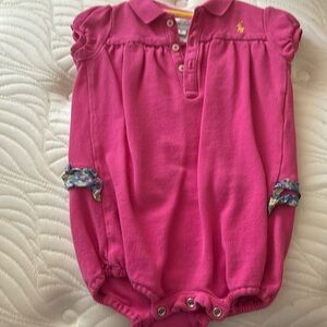 Pink Ralph Lauren onesie.